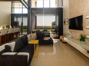 Μια τηλεόραση ή/και κέντρο ψυχαγωγίας στο Quayside Waterfront Apartment