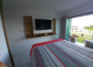 Voodi või voodid majutusasutuse Excelente flat térreo condomínio villa monte castelo toas