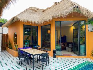 Patio nebo venkovní prostory v ubytování Dojo pool villa