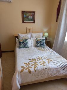 Кровать или кровати в номере La Villa Marie Joana
