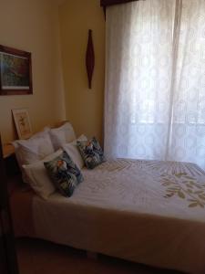 Кровать или кровати в номере La Villa Marie Joana