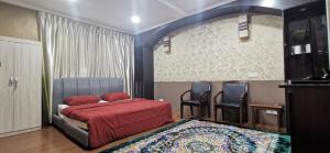 Katil atau katil-katil dalam bilik di OYO Home 90372 Greybirds Hostel