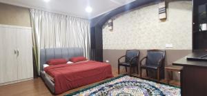 Katil atau katil-katil dalam bilik di OYO Home 90372 Greybirds Hostel