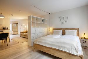 Postel nebo postele na pokoji v ubytování homie stay Julius Apartments - Iphofen