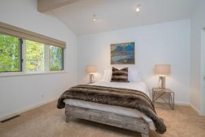 Postel nebo postele na pokoji v ubytování Sheep Meadow 102