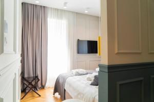Postel nebo postele na pokoji v ubytování Villa Central