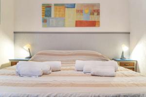 Ένα ή περισσότερα κρεβάτια σε δωμάτιο στο Santa Marinella - La Terrazza sul Mare