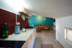 Kuchyň nebo kuchyňský kout v ubytování Apartman Azra