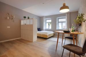 Postel nebo postele na pokoji v ubytování homie stay Julius Apartments - Iphofen