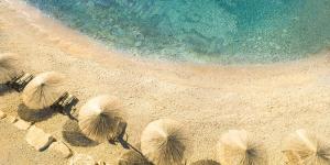an overhead view of a beach with umbrellas at Aminess Vival Maestral Hotel in Novigrad Istria