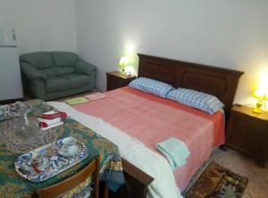 En eller flere senge i et værelse på B&B 76 EURO a NOTTE