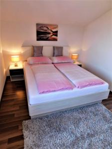 Łóżko lub łóżka w pokoju w obiekcie Apartman "Sabine" with heated pool