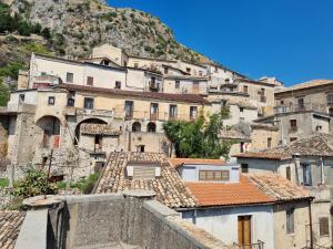 a group of buildings on a mountain at Casa Vacanza Leo in Stilo