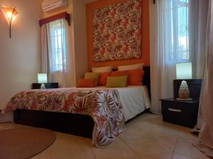 Кровать или кровати в номере La Villa Marie Joana