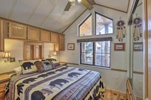 a bedroom with a bed in a room with windows at 6 Mi to Slopes! Mtn-View Breck Gem w/ Resort Perks in Breckenridge +20 photos