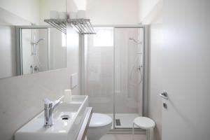 Koupelna v ubytování Hotel Benvenuto