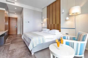 Postel nebo postele na pokoji v ubytování Hotel Bracera
