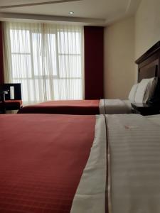 HOTEL MADEIRA客房内的一张或多张床位