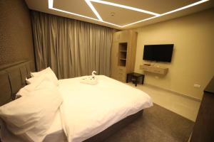 Imagine din galeria proprietății فندق صحارى الخليج Sahara Gulf Hotel Apartments în Amman +26 fotografii