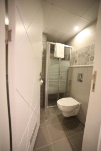 Ванна кімната в فندق صحارى الخليج Sahara Gulf Hotel Apartments