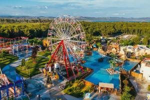 an overhead view of an amusement park with a ferris wheel at Pirovac - most beautiful beaches in Dalmatia in Pirovac