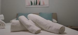 A bed or beds in a room at Stella Marina Holiday Home