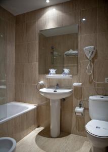 Koupelna v ubytování Hotel Casa Aurelia