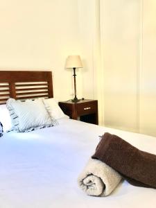 a bedroom with a bed with a towel on it at Miramar Ski - your home away from home - in Sierra Nevada +36 photos