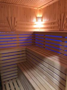 an empty sauna with a light in the middle at Котедж ВІКТОРІЯ in Bubnyshche