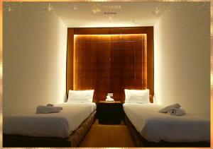 Assaraya Palace Hotel客房内的一张或多张床位