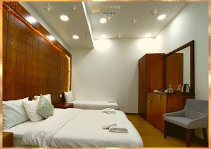 Assaraya Palace Hotel客房内的一张或多张床位