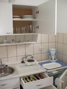 Dapur atau dapur kecil di Petrovics Apartmanház