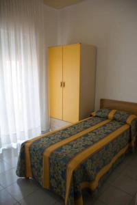 Postel nebo postele na pokoji v ubytování Pensione Villa Joli