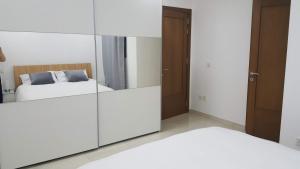 Tempat tidur dalam kamar di The Pines