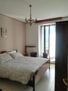A bed or beds in a room at la casa nel prunent