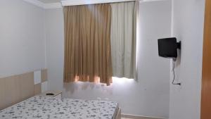 Cama o camas de una habitación en Águas da Serra Apart Hotel 5 fotos más