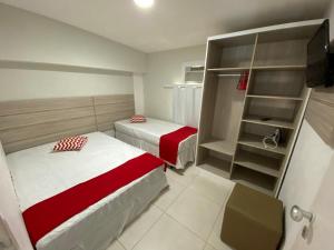 A bed or beds in a room at Ancorar Flat Porto de Galinhas-Flat 3311-3314