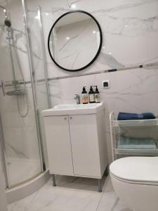Ένα μπάνιο στο Apartament Classic Południe
