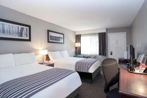 Cama ou camas em um quarto em Sandman Inn Cache Creek