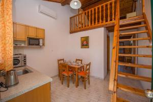 Η κουζίνα ή μικρή κουζίνα στο Georgia Apartments Sidari