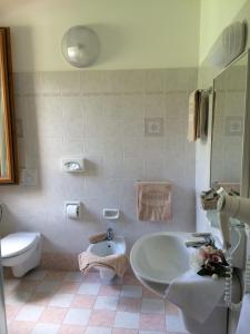 Et badeværelse på Albergo Rusall