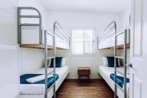 Postel nebo postele na pokoji v ubytování Woolgoolga Beach Holiday Park