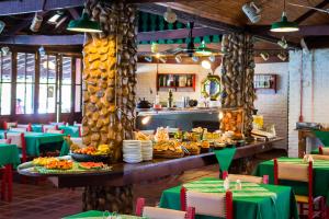 A restaurant or other place to eat at Hotel Fazenda Bavaria