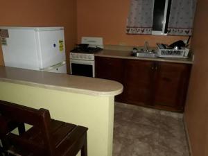 Kuchyň nebo kuchyňský kout v ubytování Apartahotel Next Nivel - Two bedroom Apartment
