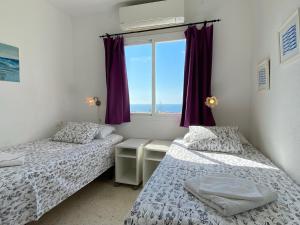 Posteľ alebo postele v izbe v ubytovaní Casa Lovisa Private Pool Casasol