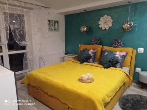 Posteľ alebo postele v izbe v ubytovaní Apartamenty Sowianka