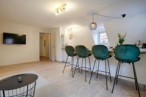 TV a/nebo společenská místnost v ubytování homie stay Julius Apartments - Iphofen