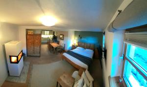 A bed or beds in a room at Lilly Fein