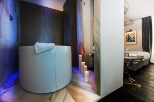 Een badkamer bij HT6 Hotel Roma