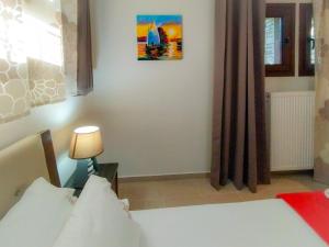 A bed or beds in a room at Sundays Family House/Studio